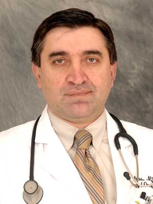 Headshot of Wail Alnas, MD, specializing in Hematology and Oncology.